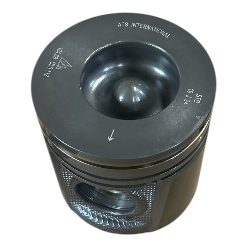 Metallic piston with 'ATS International' branding on a white background